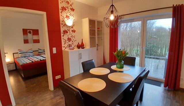 Holiday Apartment "Wikingerland Typ 1 Erdgeschoss" with Private Terrace, Shared Garden & Wi-Fi