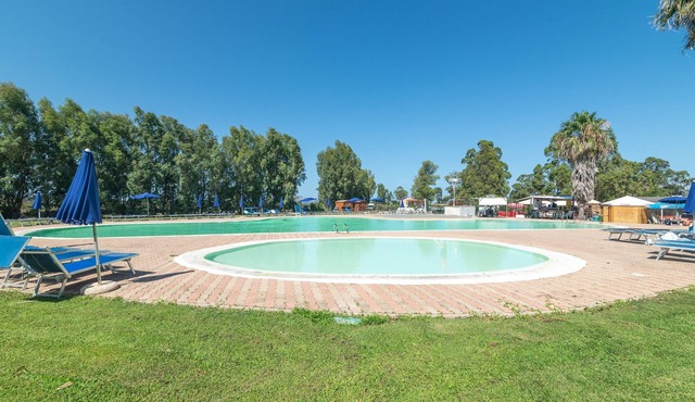 Holiday Home 'Casa Vacanze Olbia' with Shared Pool, Balcony and Air Conditioning