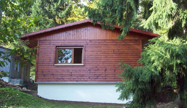 Holiday home with garden by the forest