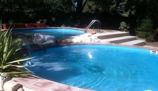 Holiday home with pool and air conditioning