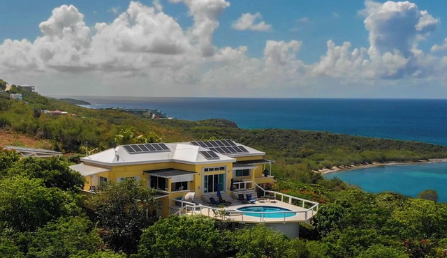 Home with panoramic views with access to private beach!