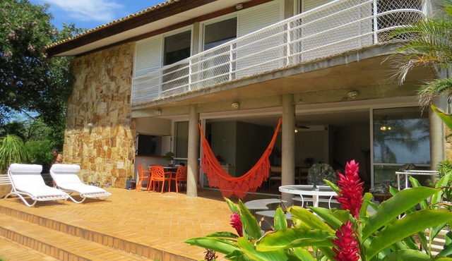 House 'foot in the sand', facing the air, river and forest: paradise!