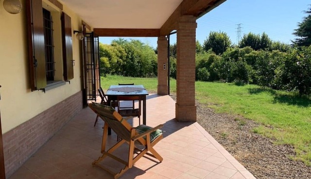House nestled in the countryside of Vignola