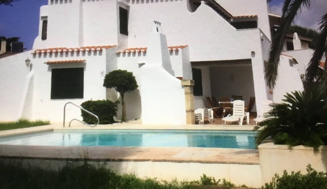House with pool near the beach and marina