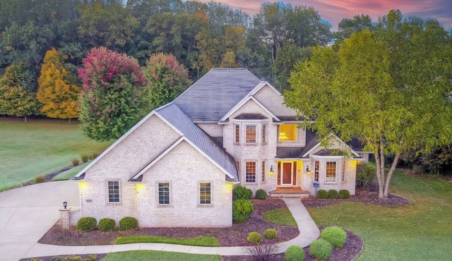 Huge home with theater, hot tub, golf cart, and just minutes from Lambeau Field!