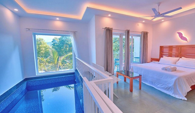 Ice Cliff Munnar by VOYE HOMES