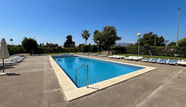 Idyllic apartment steps from the beach with mountain views