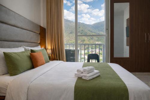 Ima Ganga Hotel - Aesthetic, Quite Mountain View Rooms In Upper Tapovan with netflix, free airport pickup for 7 or more nights booking