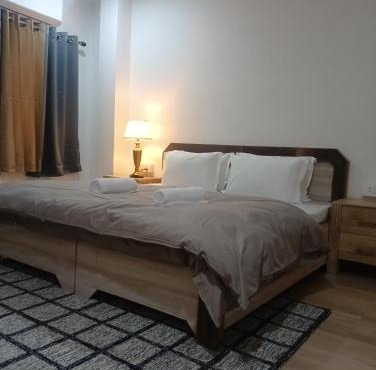 Ima Sadhana Hotel - Sunlit Rooms in Upper Tapovan, PanchKarma, Yoga, Meditation, Ayurvedic Massage With Free Airport Pickup for bookings more than 7 nights