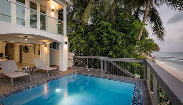 Imagine Villa- Clean & Modern Beachfront 4 bed with Penthouse
