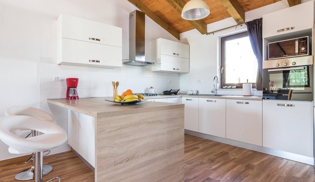 In a small village near the medieval Svetvincenat is placed this beautiful vacation home.
