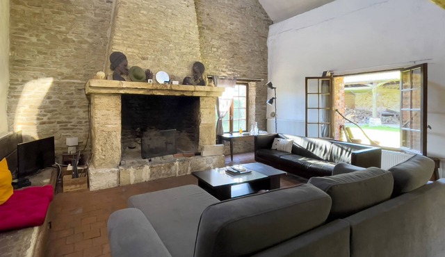 In In a charming little village in front of a XVth century chapel and a castle