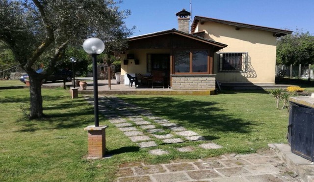 Independent villa with private beach on the lake