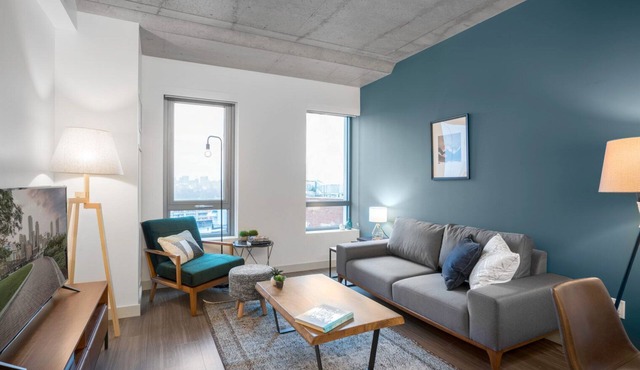 Industrial 1BR near MIT w/Gym, Doorman, Roof Deck