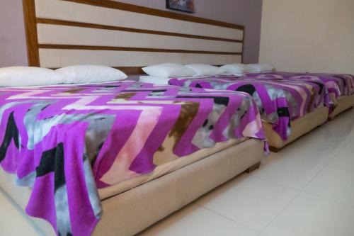 Infinity Suites triple room 203