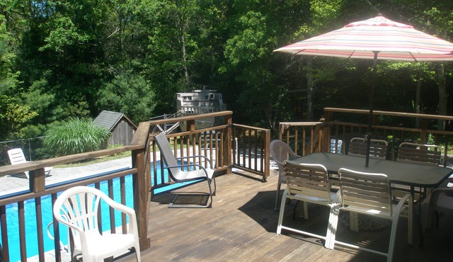 Inground Pool with patio, large deck, ship playhouse and swing