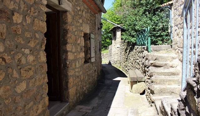 Inside a quiet and charming typical Cévennes hamlet with an open view