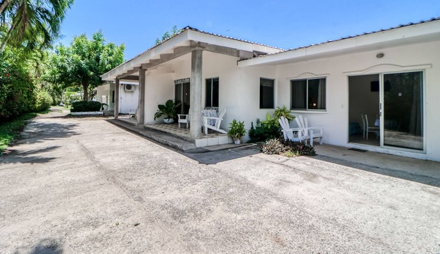 Inviting beachfront Villa w/private beach access, shared pool and gardens