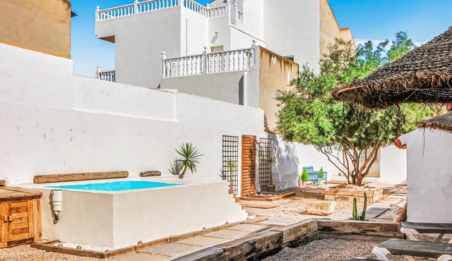 Inviting cottage in rustic style with private outdoor pool.