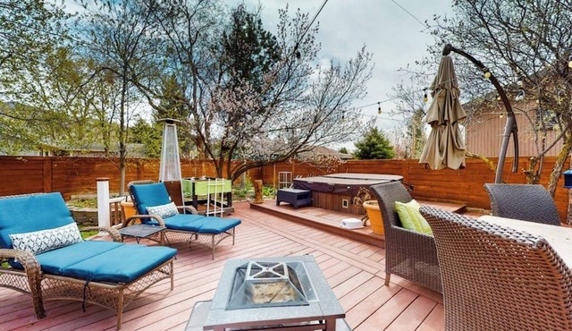 Inviting home with private hot tub, amazing deck & prime location