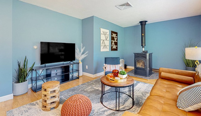 Inviting riverfront home with pool, kayaks, firepit, & W/D