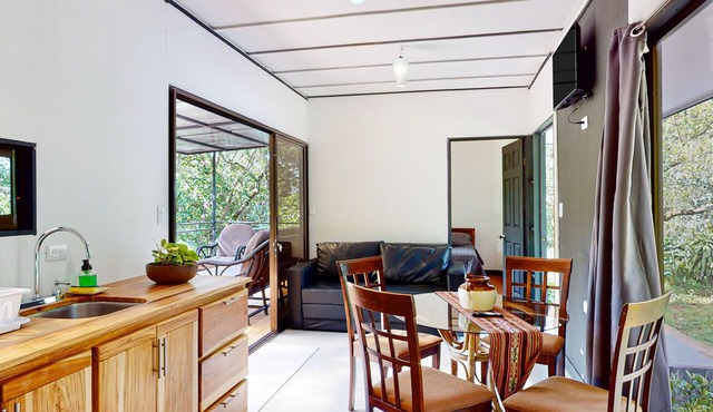 Inviting riverfront home with mountain views, full kitchen, & dog-friendly