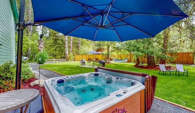 Inviting riverfront home with hot tub, firepit, W/D, & dog-friendly