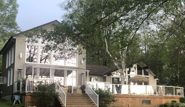 **JUST REDUCED** 5 BDRM 3 BATH LUXURY LAKE HOUSE ON SOUGHT AFTER TWELVE MILE BAY