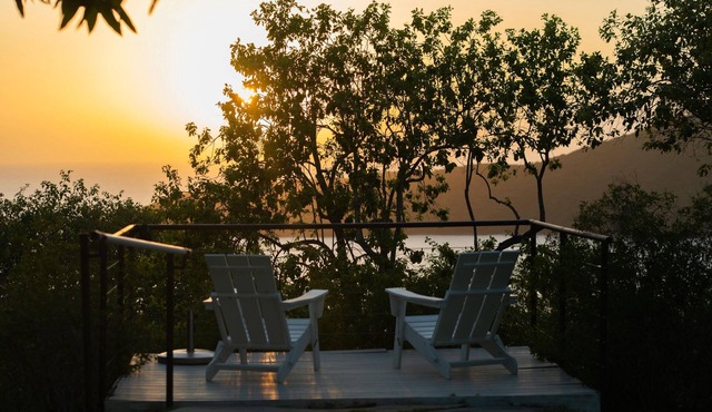 Just steps away from a tropical garden with mango trees and tropical fruits