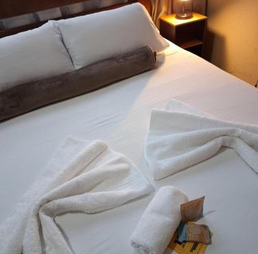 Kitnet Completa perto da Praia e do Centro, Roupas de Cama e Banho