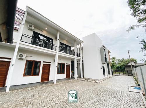 Kmanda House