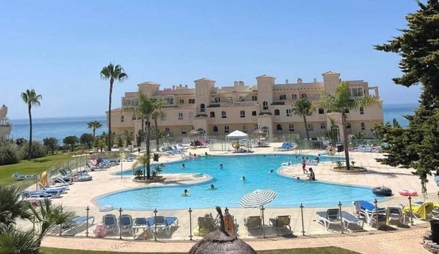 La Cala gorgeous 2 bedroom apartment with stunning gardens, pools and sea views