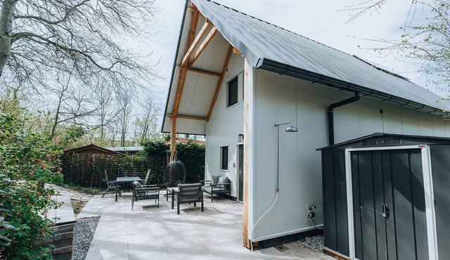 La Folie': a large, elegantly furnished holiday home with plenty of privacy at the back of a green family park.