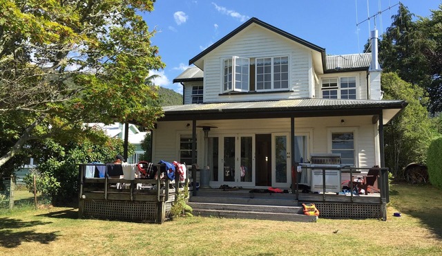 Lake Rotoiti LAKEFRONT home with jetty, boat ramp, parking & many extras!