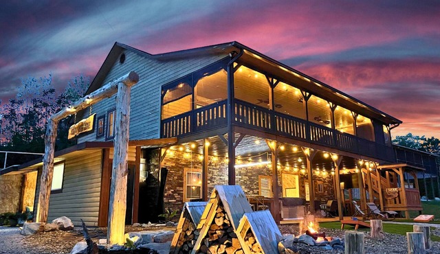 Lakefront, covered dock, hot tub, game/pool rm, 4wd trails, firepits, 22 people