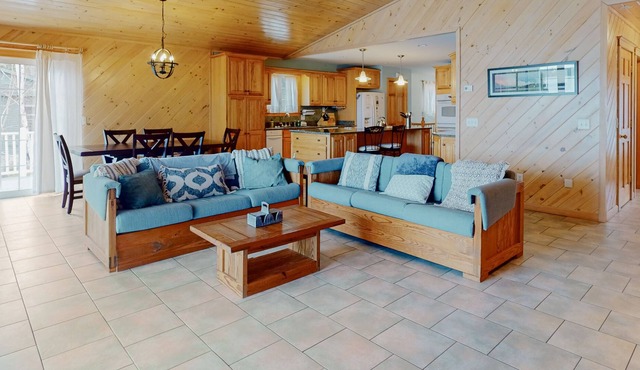 Lakefront home with dock, kayak, firepit, screened porch, fireplace, & W/D
