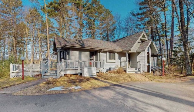 Lakefront home with private outdoor sauna, dock, firepit, wood fireplace & patio
