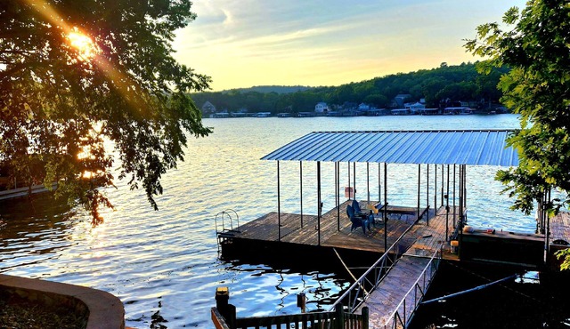 Lakefront pet-friendly home/private dock with boat slip and two place PWC lift.