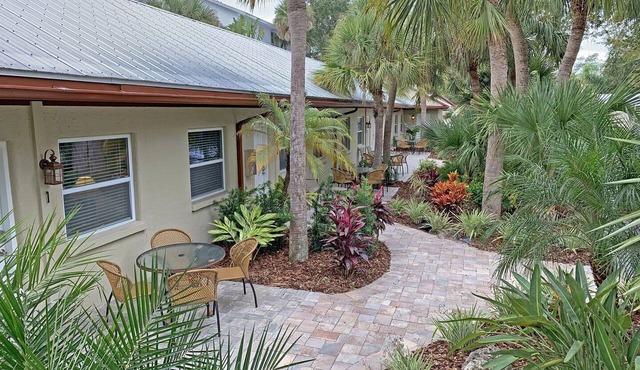 Lakefront Property on Siesta Key Among Tropical Landscape W/Heated Pool