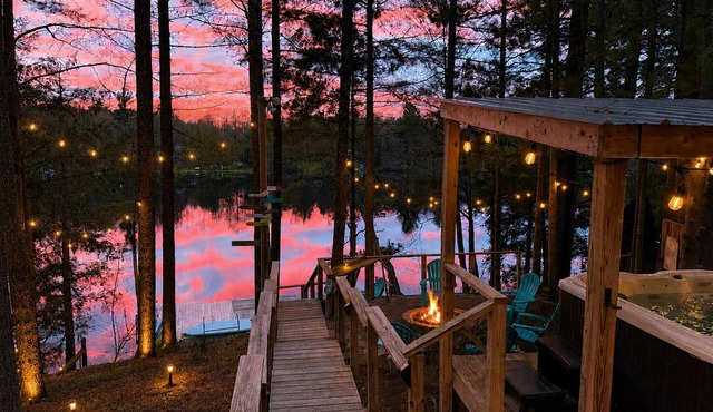 Lakefront retreat 30 min to Traverse City. Hot tub, fire pit, kayaks, game room.