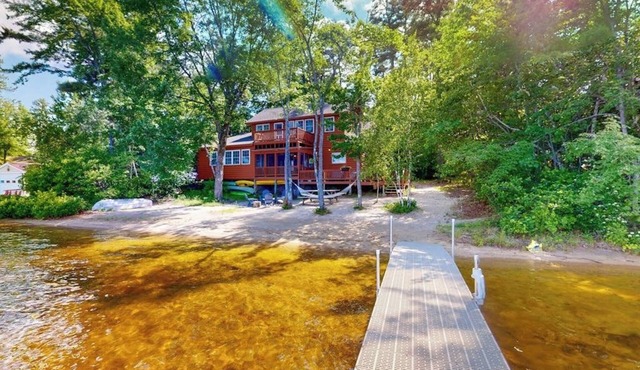 Lakeside home with private dock, firepit, grill, scenic balcony, fireplace & AC