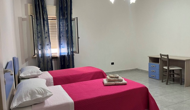 Large and Cozy 2-bedroom apartment in charming Corigliano-Rossano with WiFi, AC