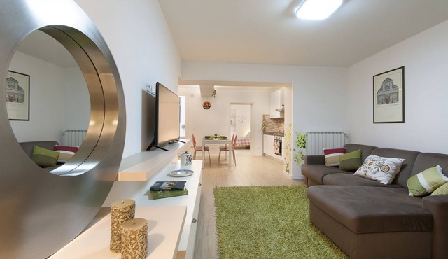 Large and completely refurbished apartment with a beautiful patio.