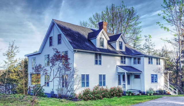 Large, charming lake cottage nestled in the heart of our private community.