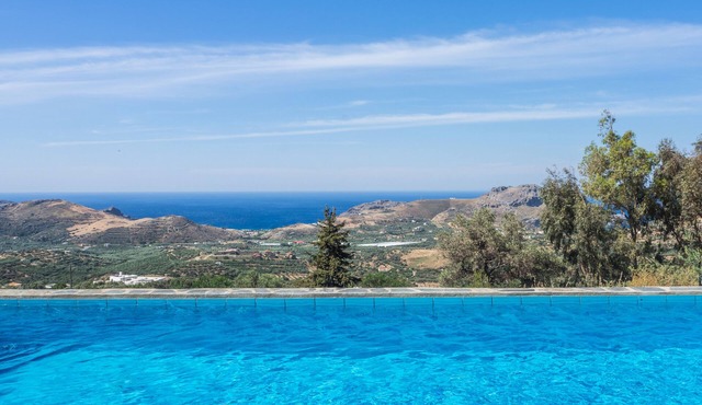 Large modern villa situated on a hill in the traditional village of Marious.