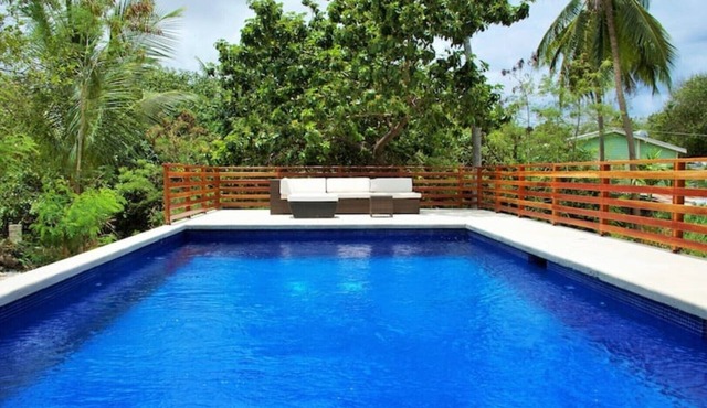 Large modern villa with pool on West Coast near beach & restaurants w/parking.