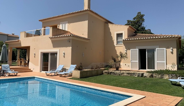 Large private detached three bedroom villa with heated infinity swimming pool