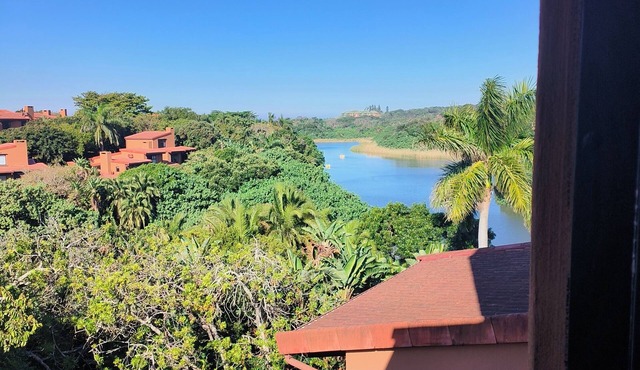 Large, spacious 2-bedroom, 2.5-bathroom villa, river views, golf ,tennis , beach