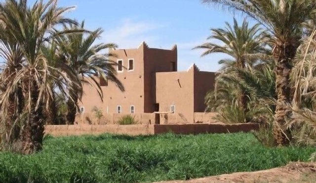 large traditional adobe riad on the edge of the sahara