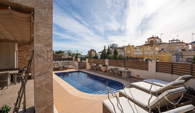 Large villa with private pool and walking distance to La Mata beach. Child-friendly.